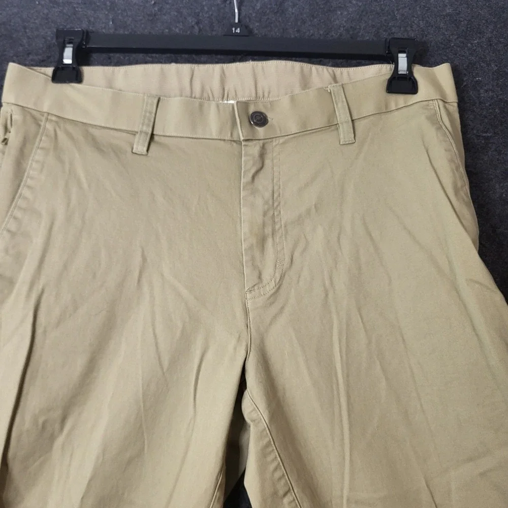 Fabletics The One Pant Mens 34x34 Khaki Tan Stretch Chino PT2354910-3487-34034